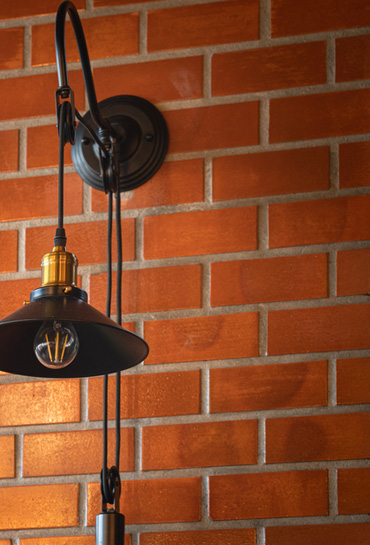 Photo of black lamp hanging in office right style-v1